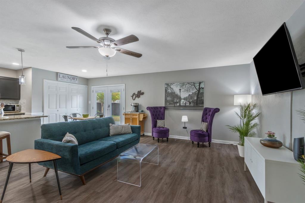 5652 Phelps Street The Colony, TX 75056 - Photo 9 of 29 a living room with furniture and a flat screen tv
