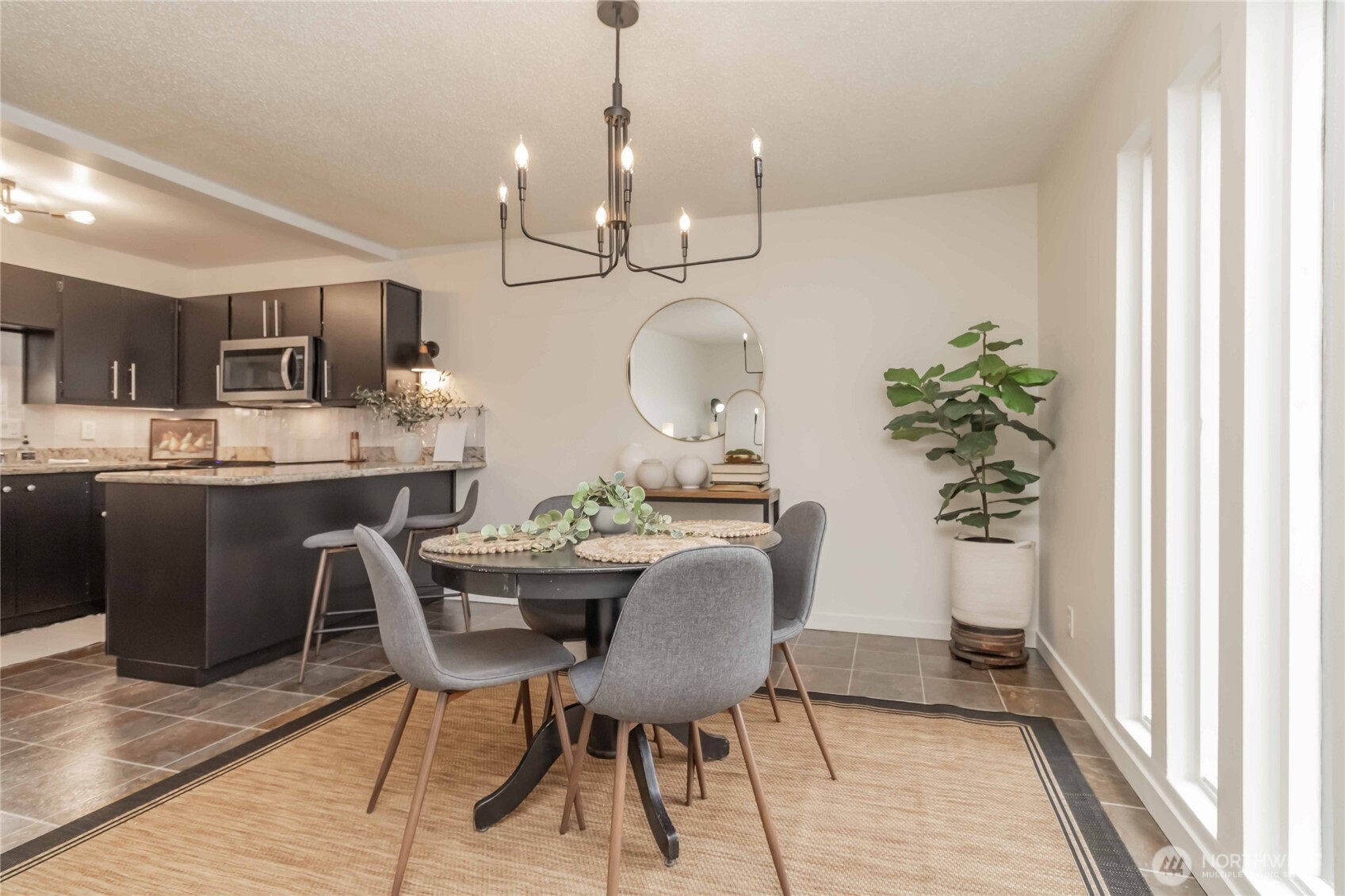 1425 South Puget Drive, Unit O4 Renton, WA 98055 - Photo 11 of 32 a dining room with furniture and window