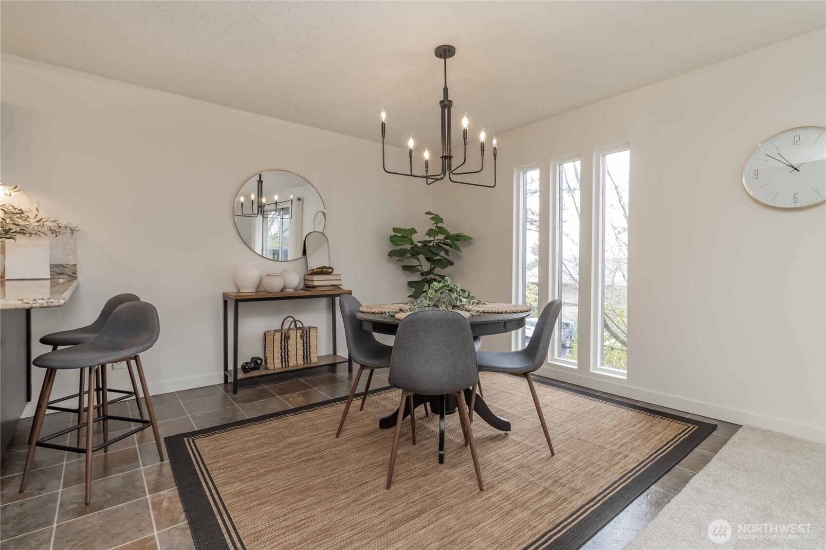 1425 South Puget Drive, Unit O4 Renton, WA 98055 - Photo 12 of 32 a view of a dining room with furniture window and wooden floor