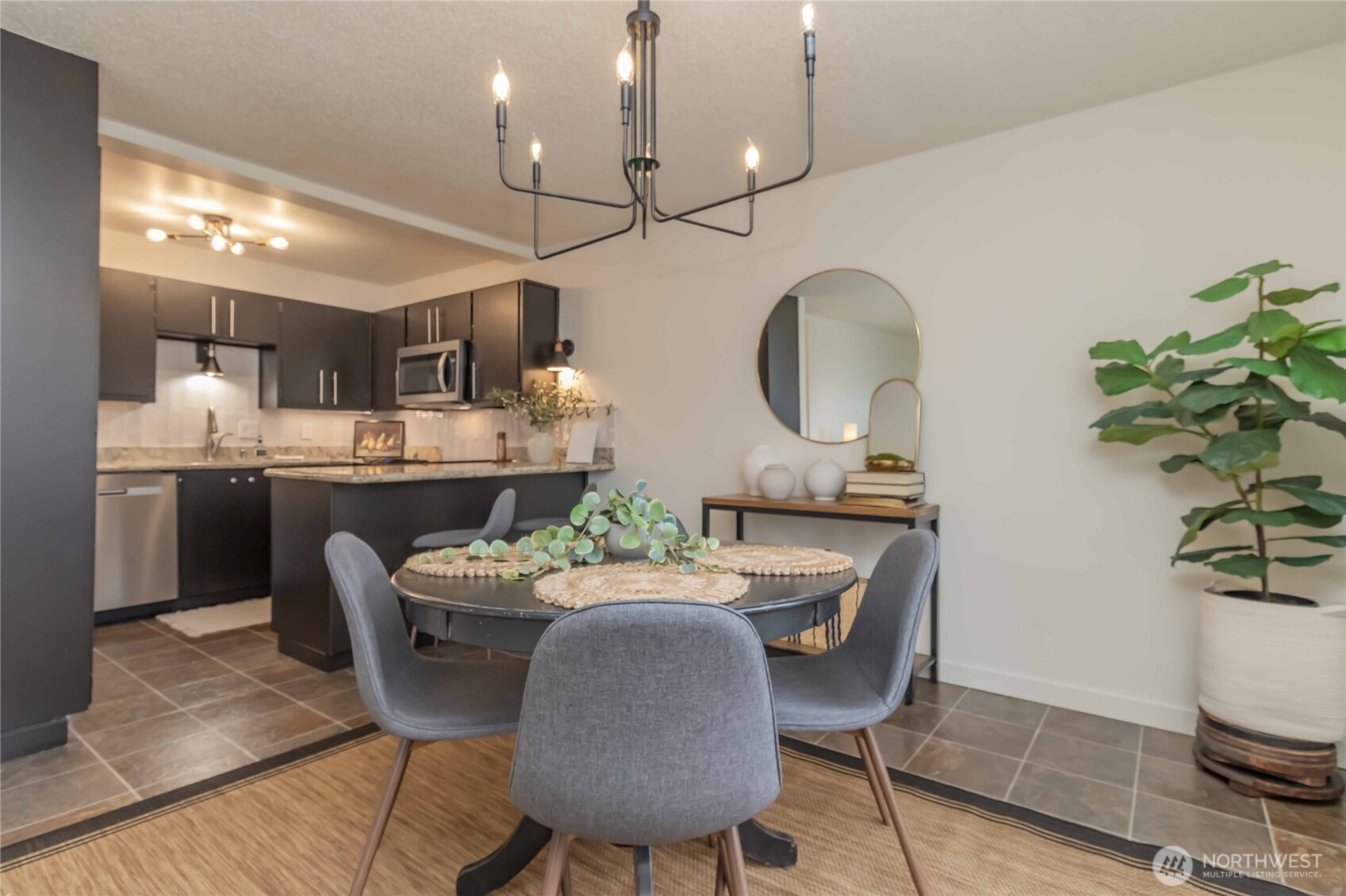 1425 South Puget Drive, Unit O4 Renton, WA 98055 - Photo 13 of 32 a dining room with furniture and window