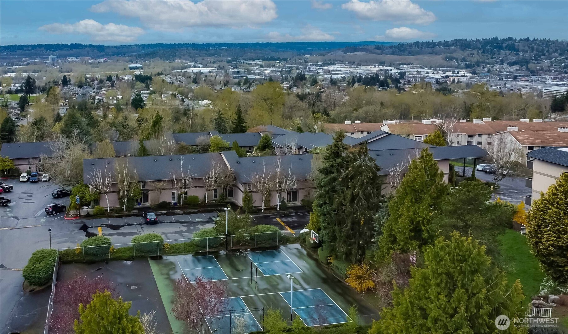 1425 South Puget Drive, Unit O4 Renton, WA 98055 - Photo 30 of 32 a view of a lake with a city