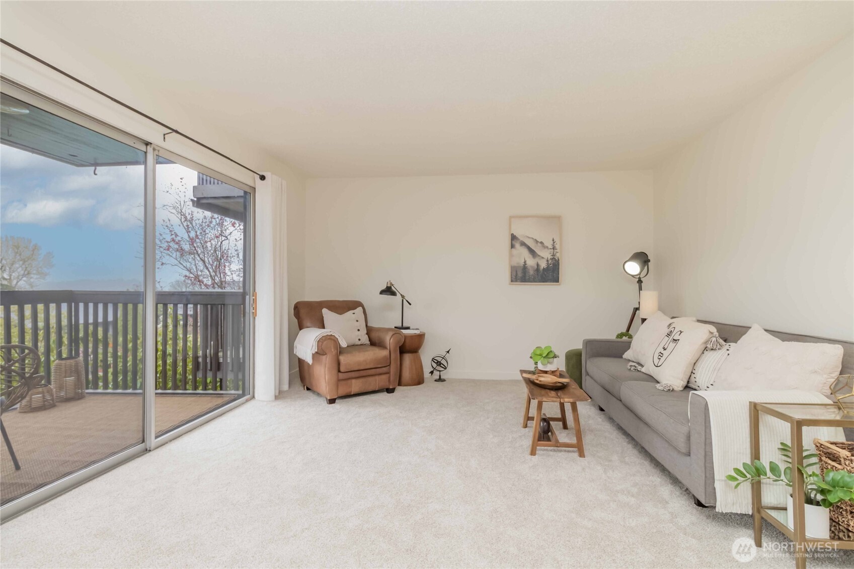 1425 South Puget Drive, Unit O4 Renton, WA 98055 - Photo 8 of 32 a living room with furniture and a large window