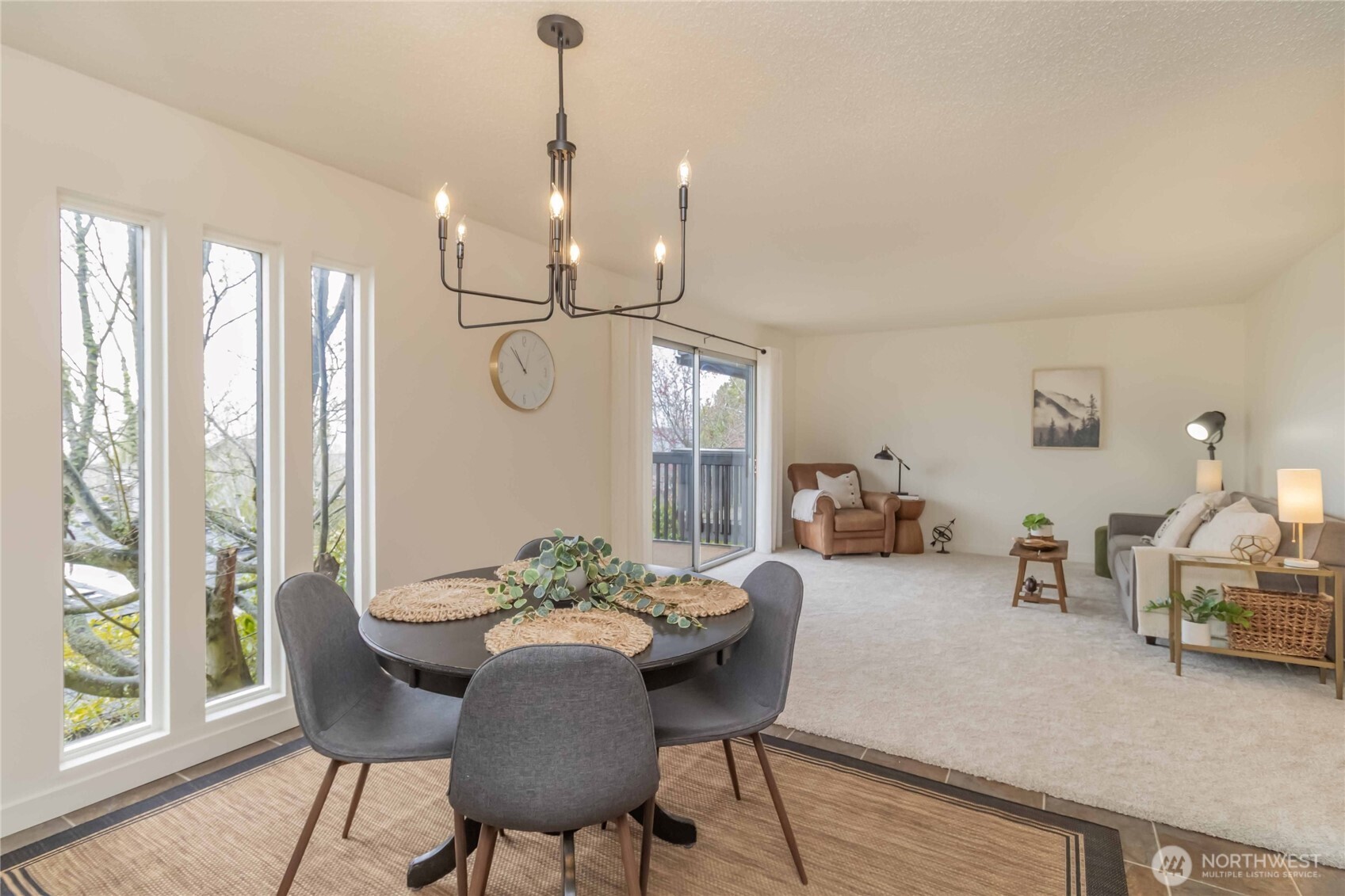 1425 South Puget Drive, Unit O4 Renton, WA 98055 - Photo 10 of 32 a view of a dining room with furniture window and wooden floor