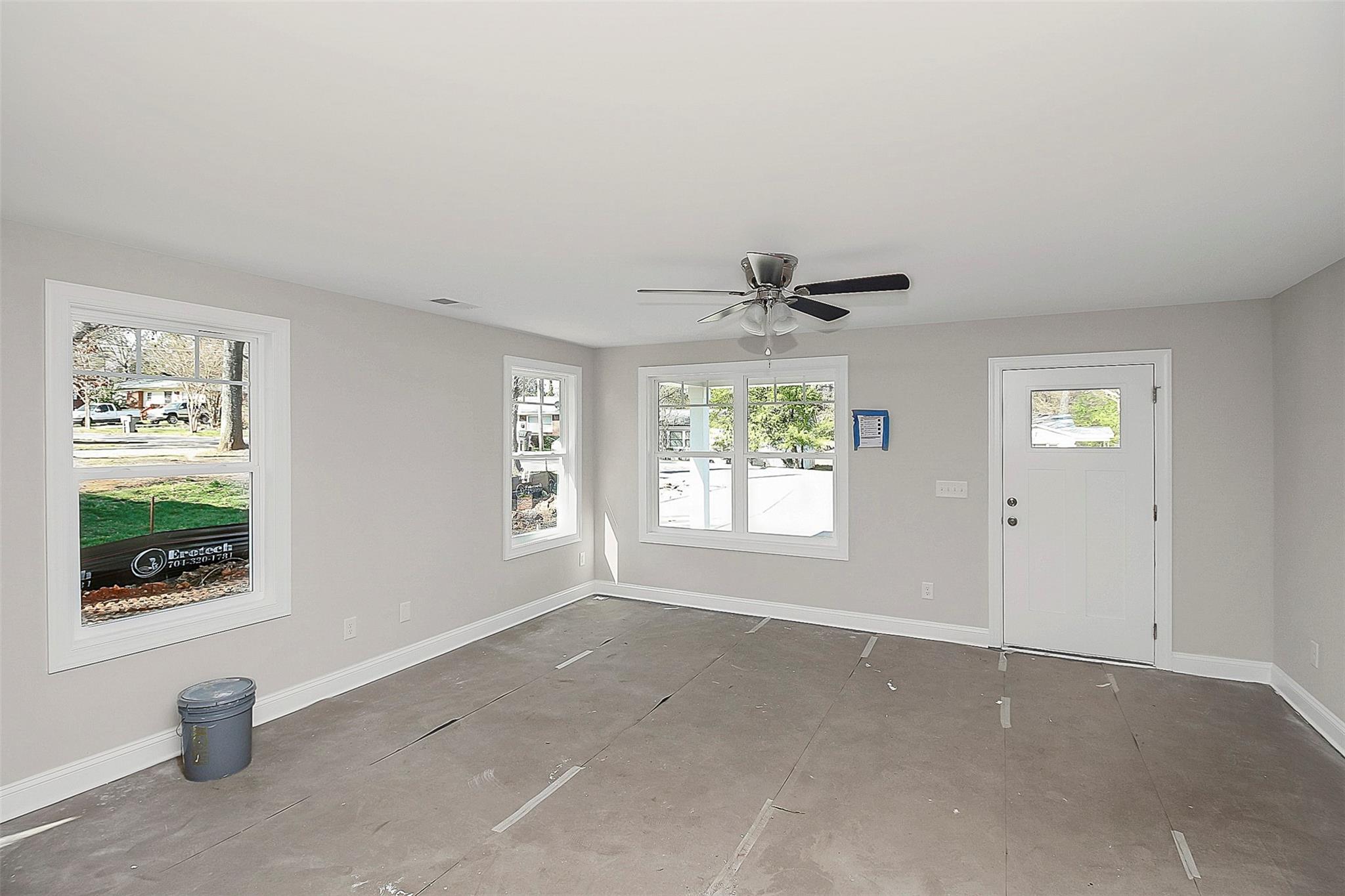 4412 Tillman Road Charlotte, NC 28208 - Photo 8 of 34 a view of an empty room with a window