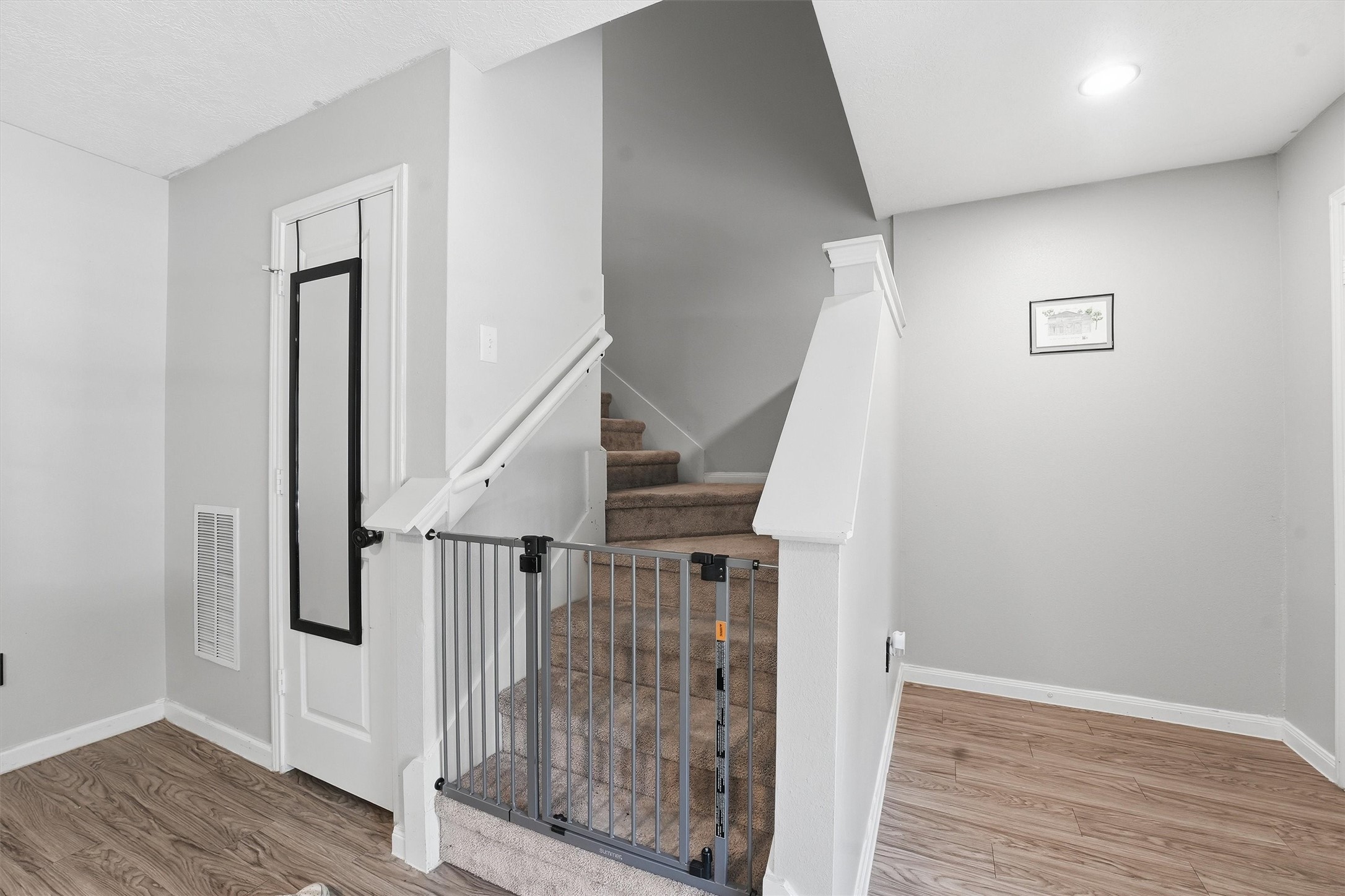 15011 Crockett Road Willis, TX 77378 - Photo 10 of 24 Staircase leading to second floor with clean, modern flow.