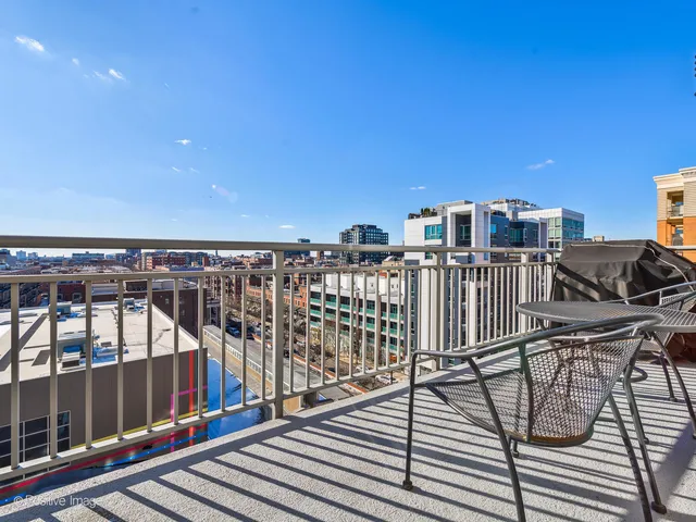 a view of a balcony with city view