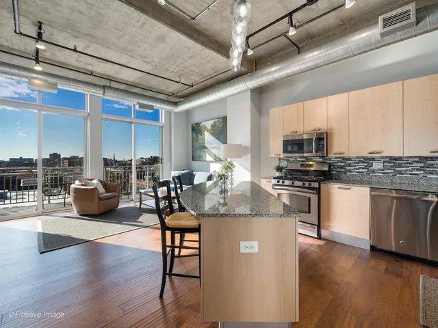 a kitchen with counter space cabinets and appliances
