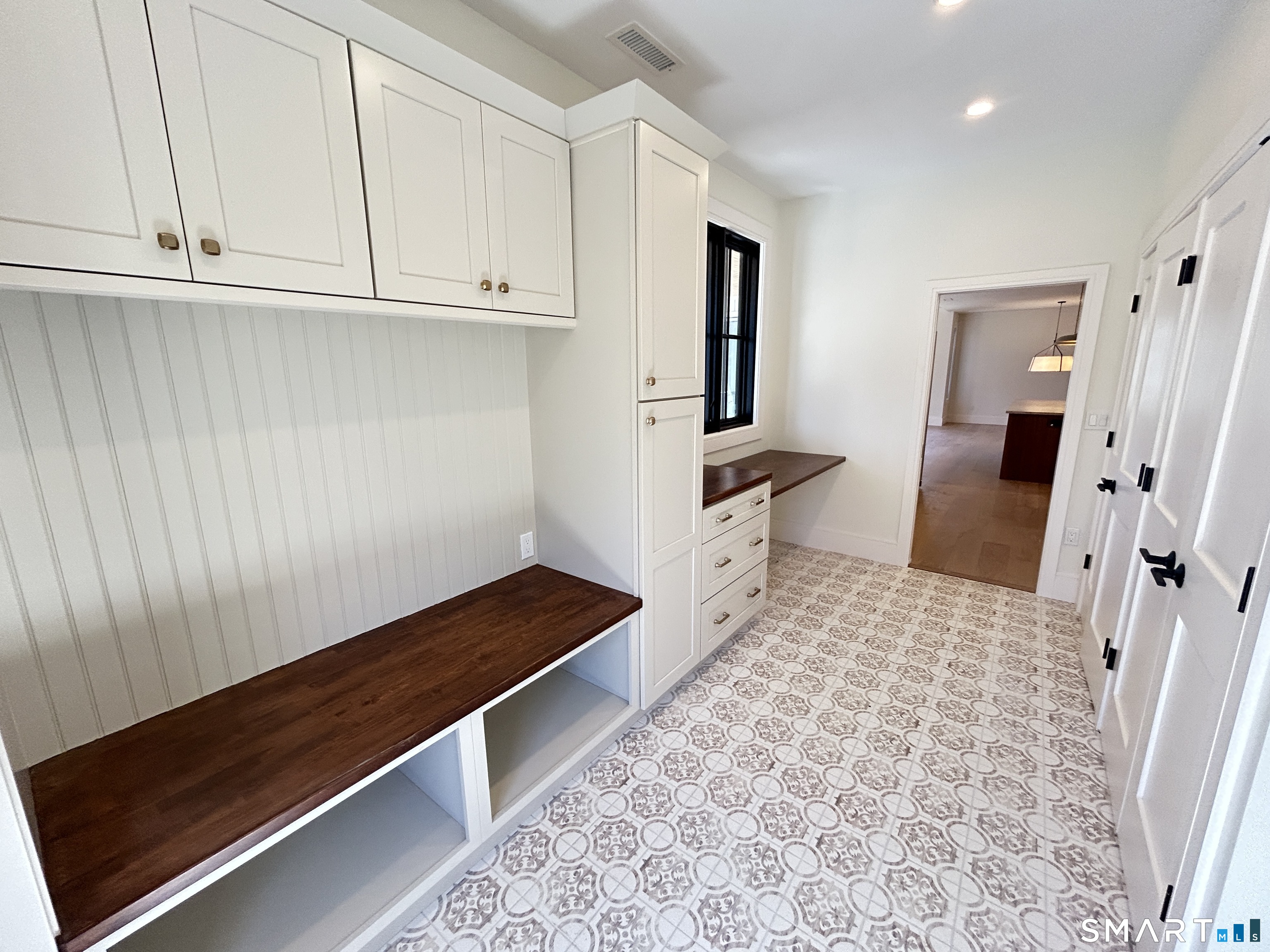 12 Chestnut Lane Washington, CT 06777 - Photo 11 of 32 DOOR TO GARAGE AND ANOTHER DOOR TO SIDE YARD