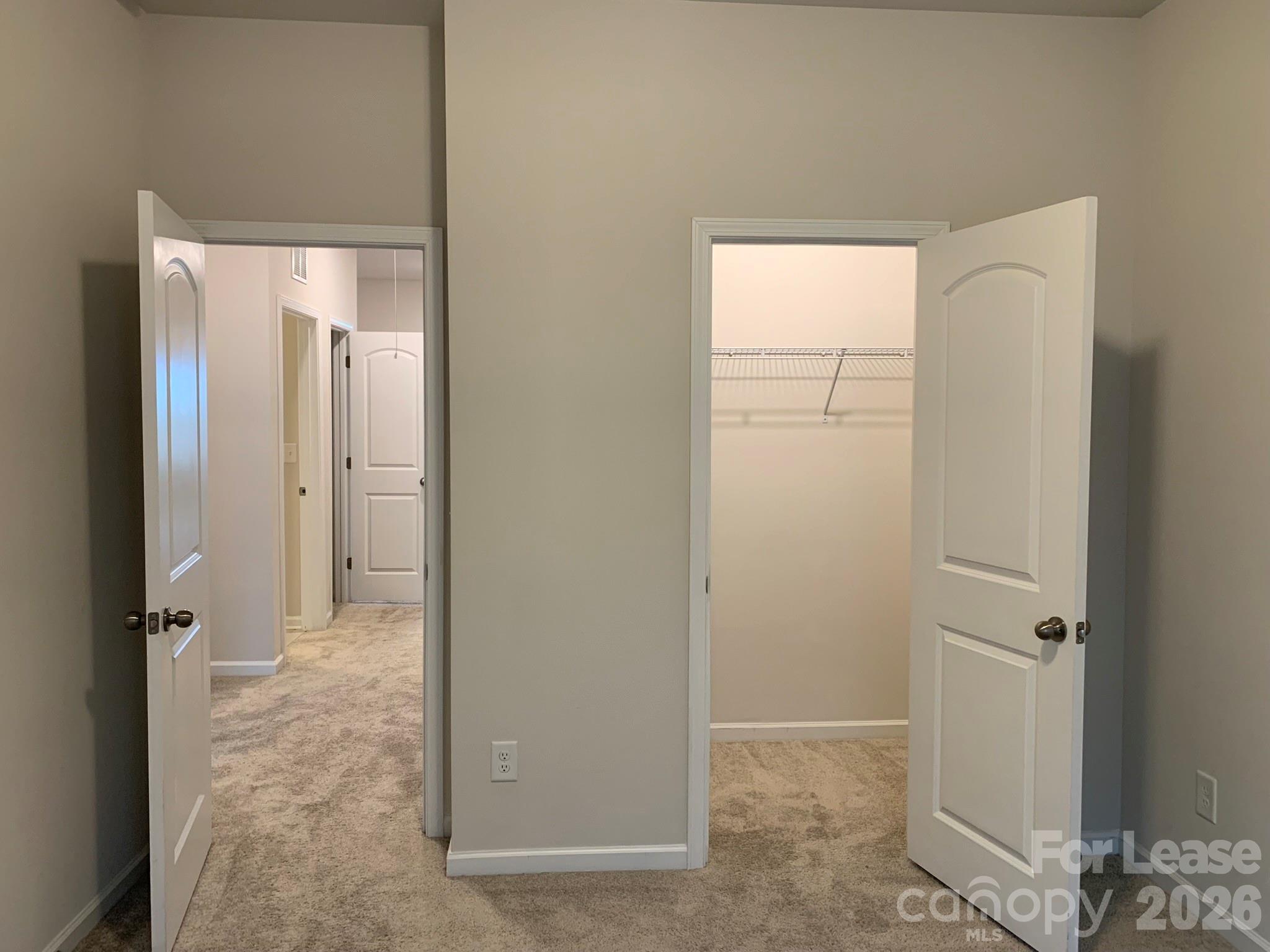 2143 Stevens Mill Road Matthews, NC 28104 - Photo 35 of 39 a view of a bathroom with a glass door and shower