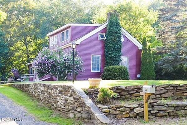 24 Southbridge Road Brimfield, MA 01010 - Photo 1 of 1 a view of a house with a yard