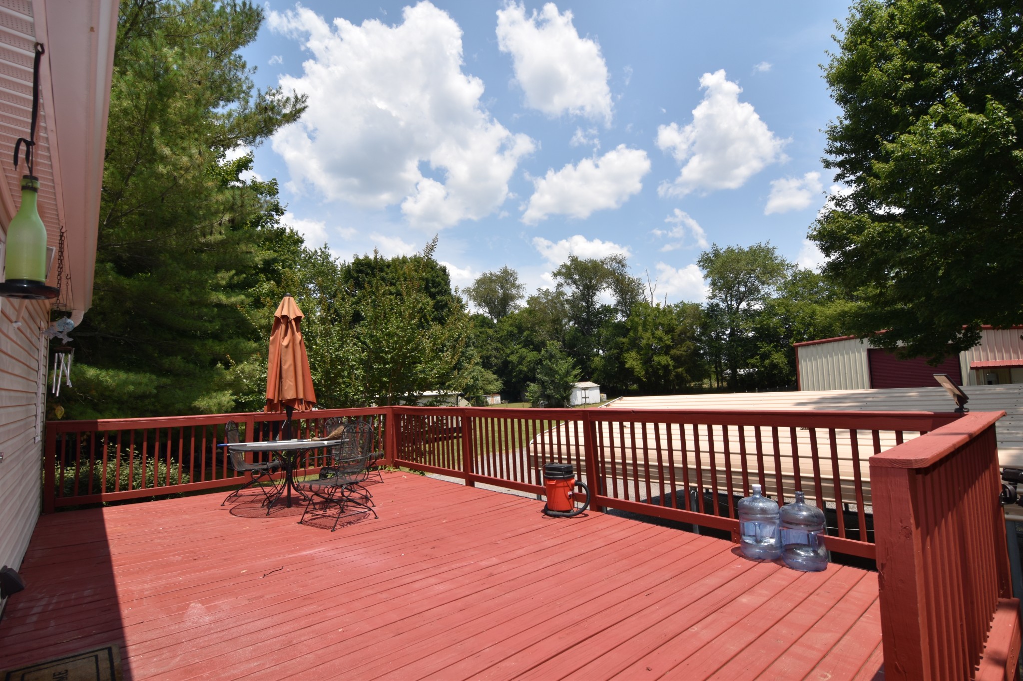 671 McCrary Road Lebanon, TN 37090 - Photo 22 of 35 a view of a roof deck with wooden floor and fence