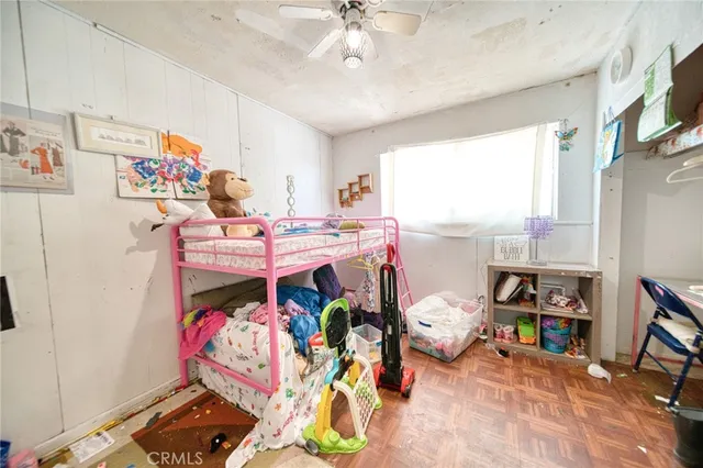 a bed room with a bed and a window