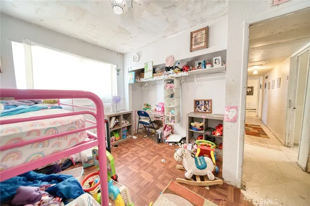 a bed room with a bed and a couch