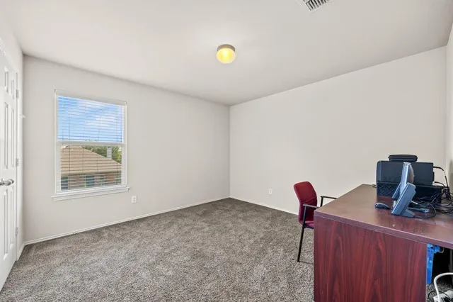 a view of work space with windows