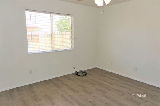 1420 South Yorktown Street Ridgecrest, CA 93555 - Photo 18 of 27 an empty room with a window