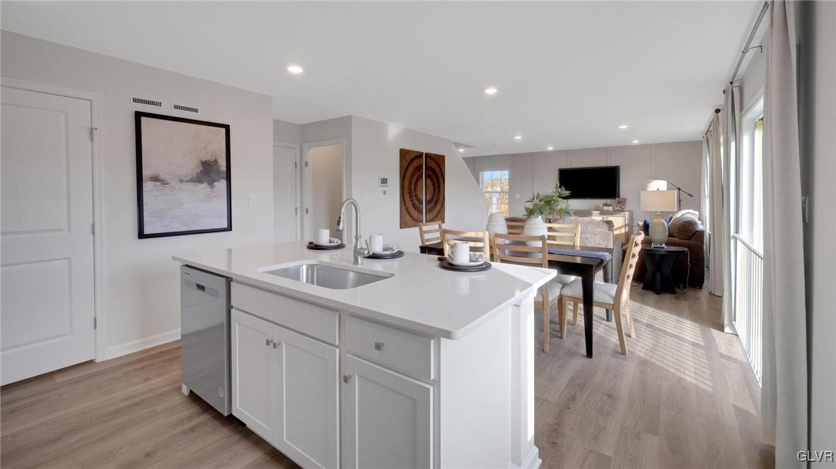 242 Winding Road Easton, PA 18040 - Photo 12 of 27 a view of kitchen with stainless steel appliances kitchen island sink stove and microwave