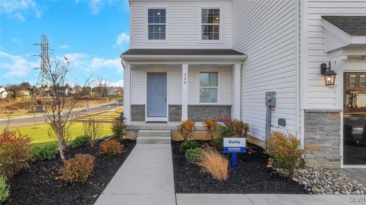 242 Winding Road Easton, PA 18040 - Photo 3 of 27 a front view of a house with outdoor seating