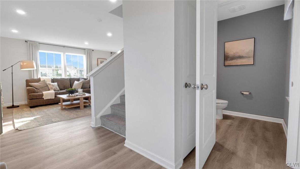 242 Winding Road Easton, PA 18040 - Photo 5 of 27 a living room with furniture and a wooden floor