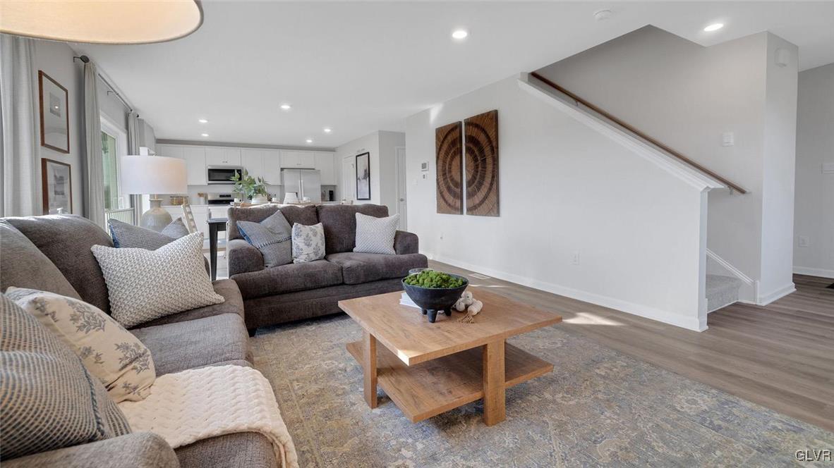 242 Winding Road Easton, PA 18040 - Photo 7 of 27 a living room with furniture and wooden floor