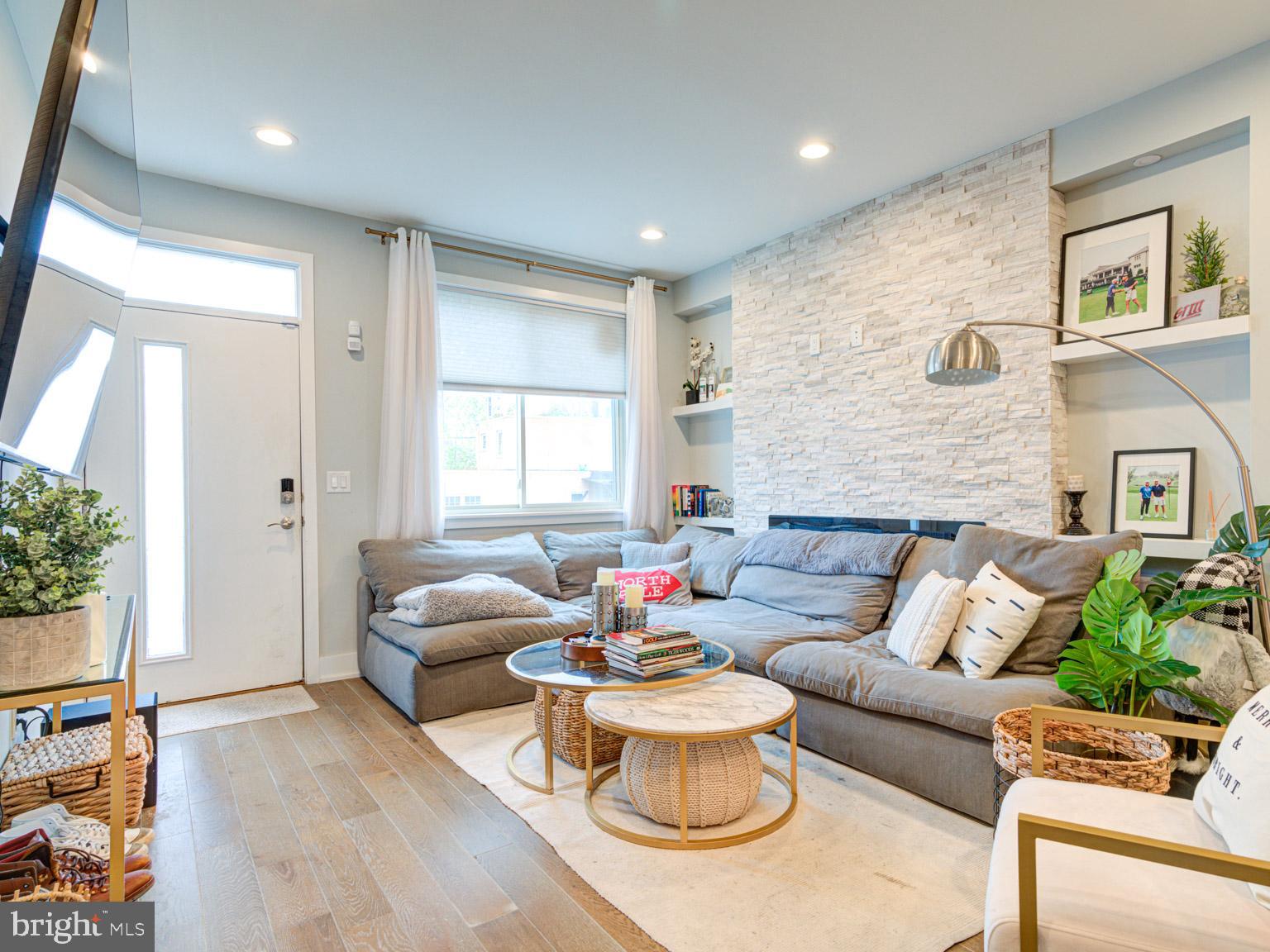 2639 Jasper Street Philadelphia, PA 19125 - Photo 2 of 23 a living room with furniture and a large window