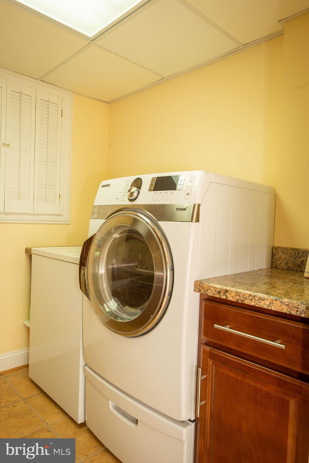7817 Chestnut Grove Road Severn, MD 21144 - Photo 21 of 26 Dedicated laundry with storage
