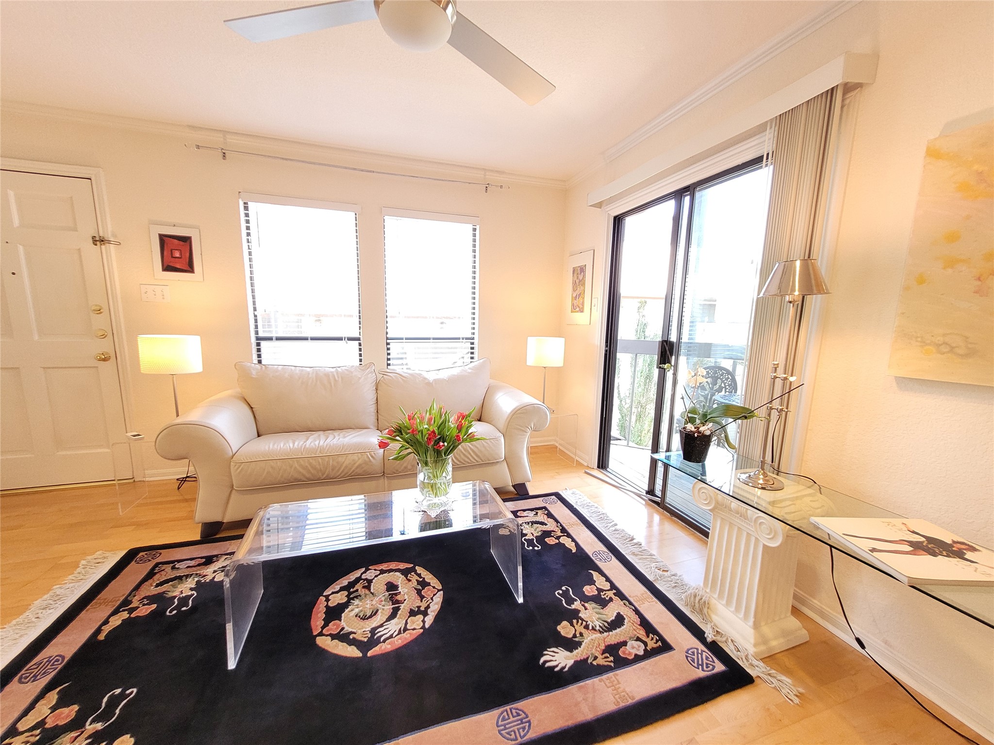 2410 Enfield Road, Unit 7 Austin, TX 78703 - Photo 13 of 19 a living room with a couch and a table