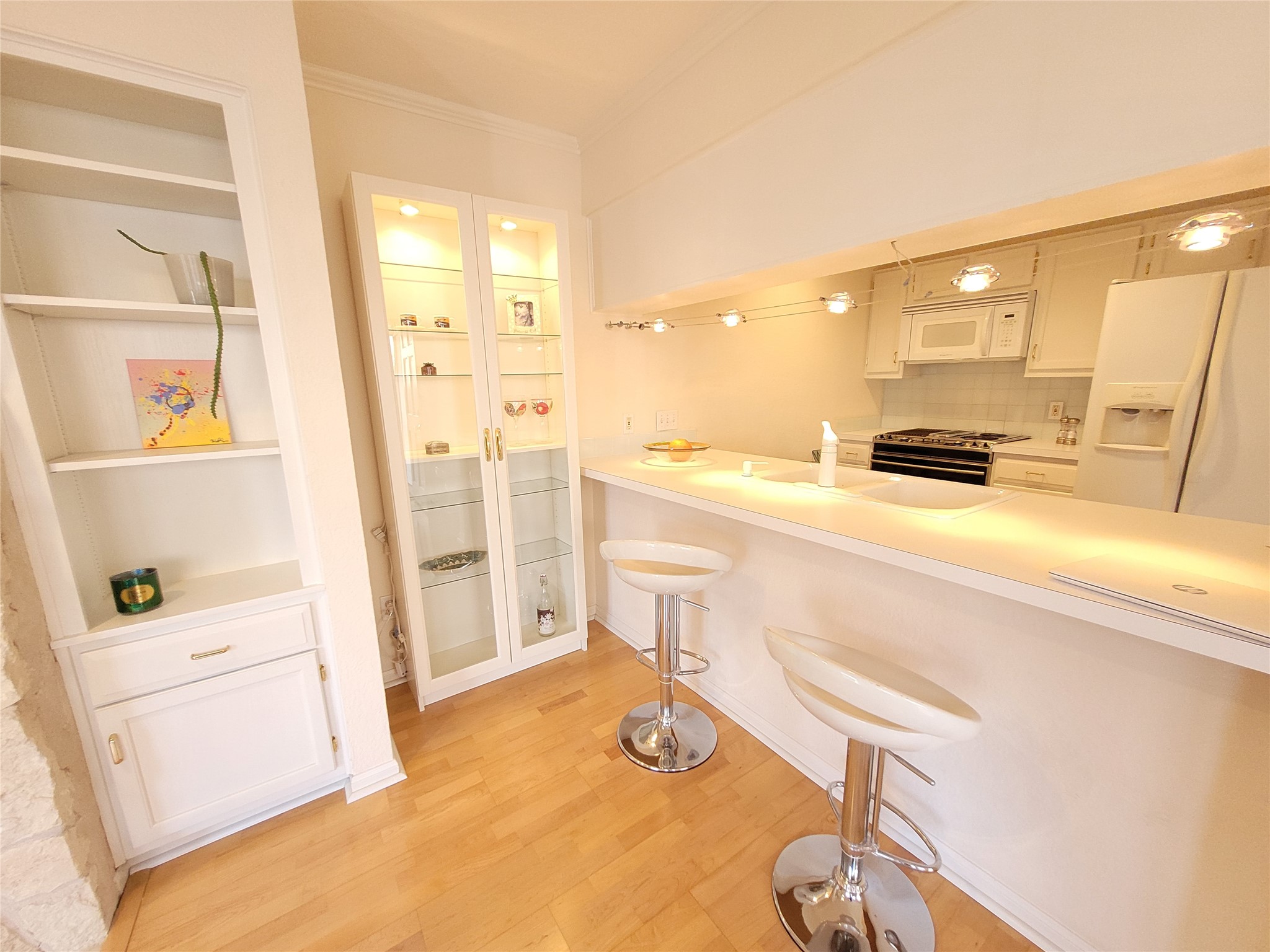 2410 Enfield Road, Unit 7 Austin, TX 78703 - Photo 2 of 19 a bathroom with a sink a toilet and a tub