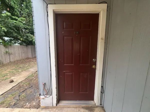a view of door with yard