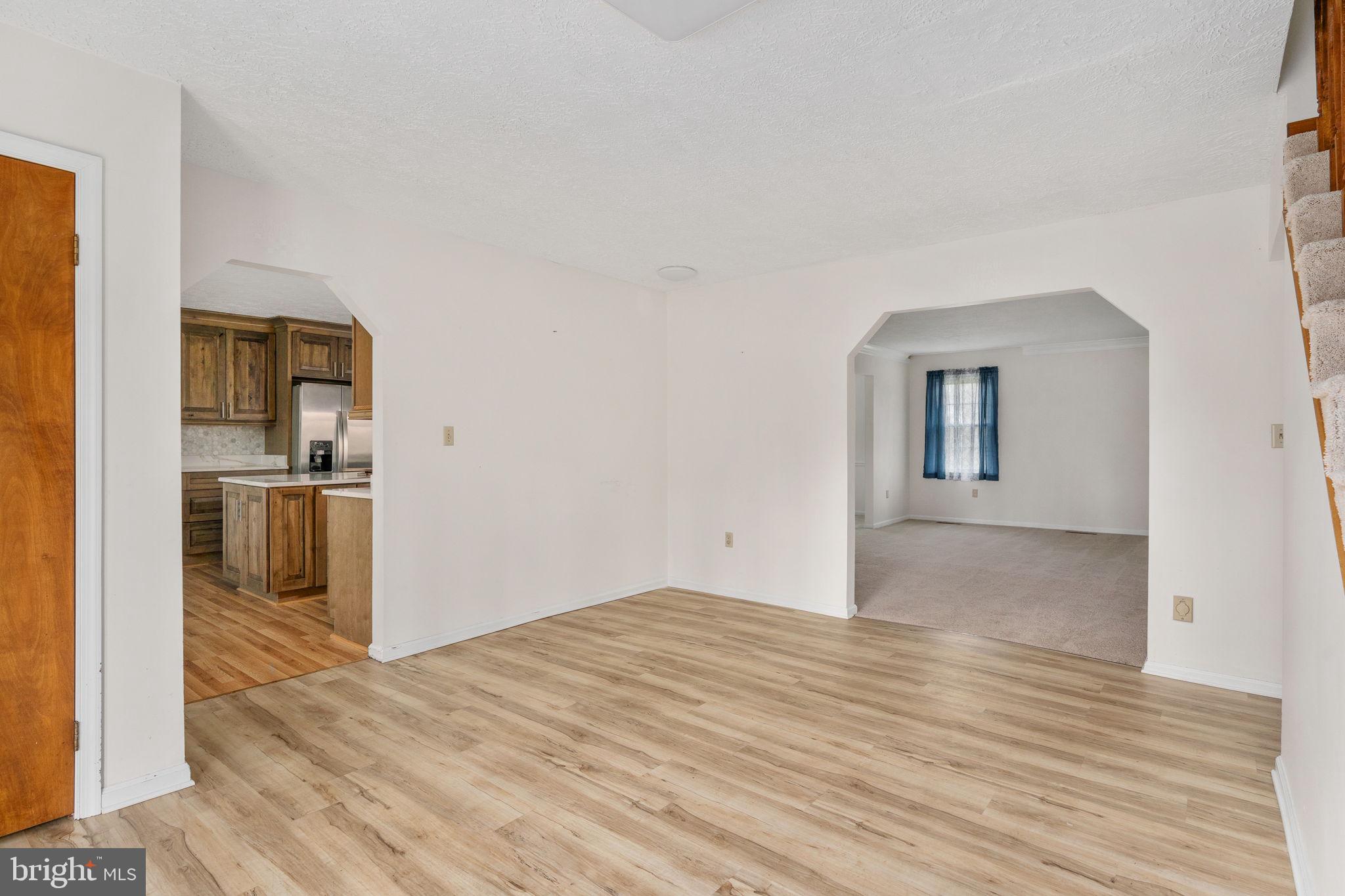 13220 Sillamon Road Goldvein, VA 22720 - Photo 5 of 57 Spacious, light-filled living area.