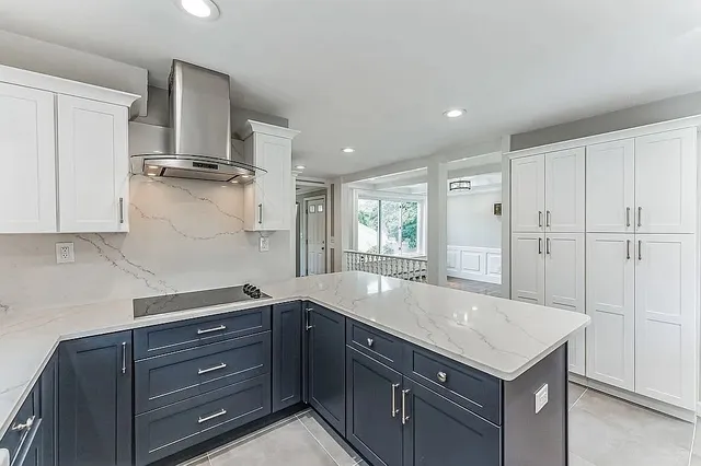 a kitchen with a sink and cabinets