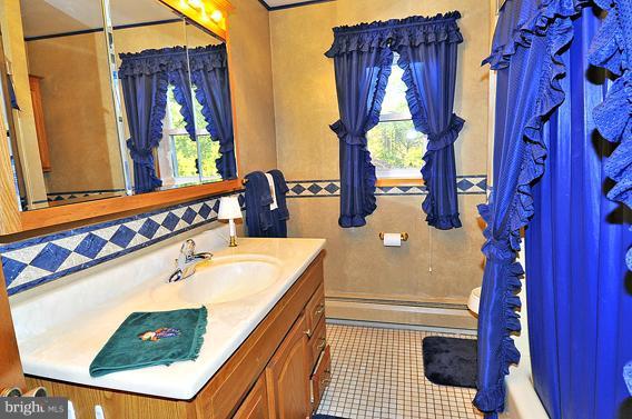 7907 Elizabeth Road Pasadena, MD 21122 - Photo 4 of 30 Bath 2