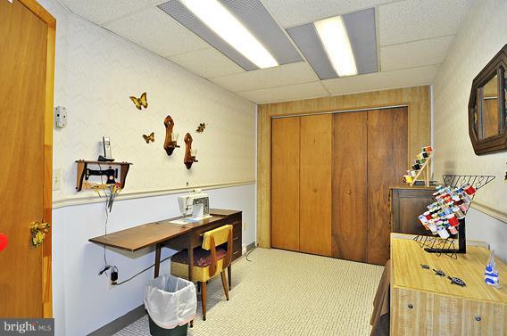 7907 Elizabeth Road Pasadena, MD 21122 - Photo 5 of 30 Basement Sewing Room