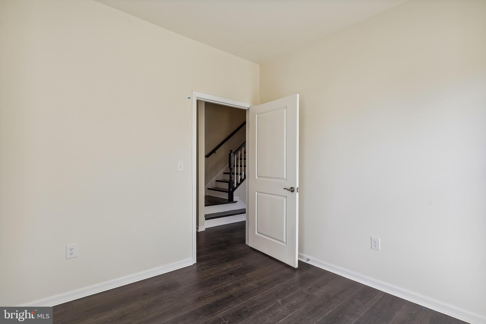 15330 Hildegard Lane Silver Spring, MD 20905 - Photo 18 of 45 an empty room with wooden floor