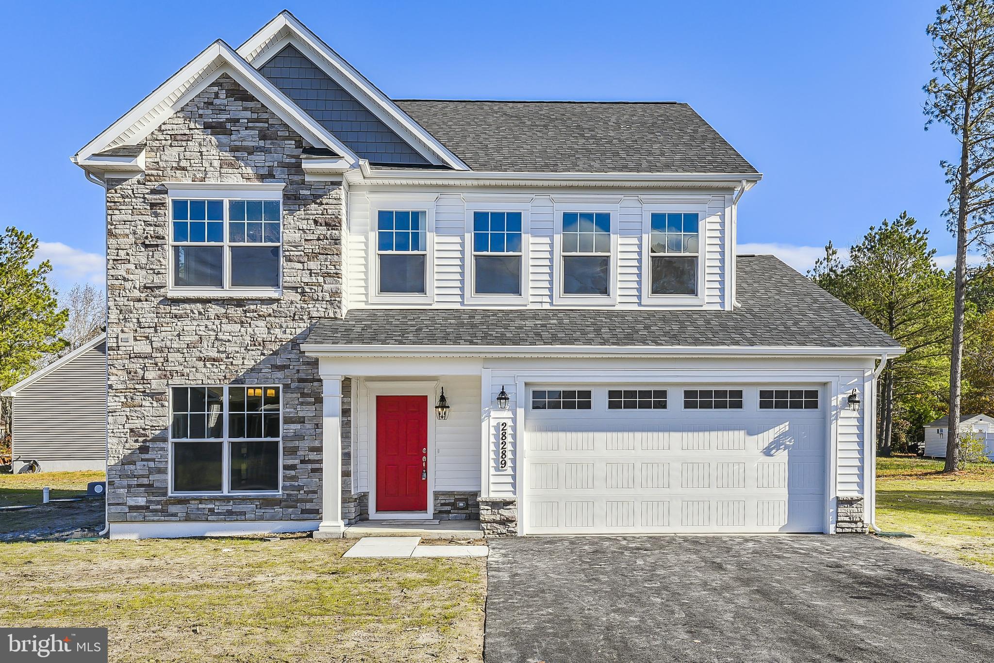15330 Hildegard Lane Silver Spring, MD 20905 - Photo 2 of 45 a front view of a house with a yard