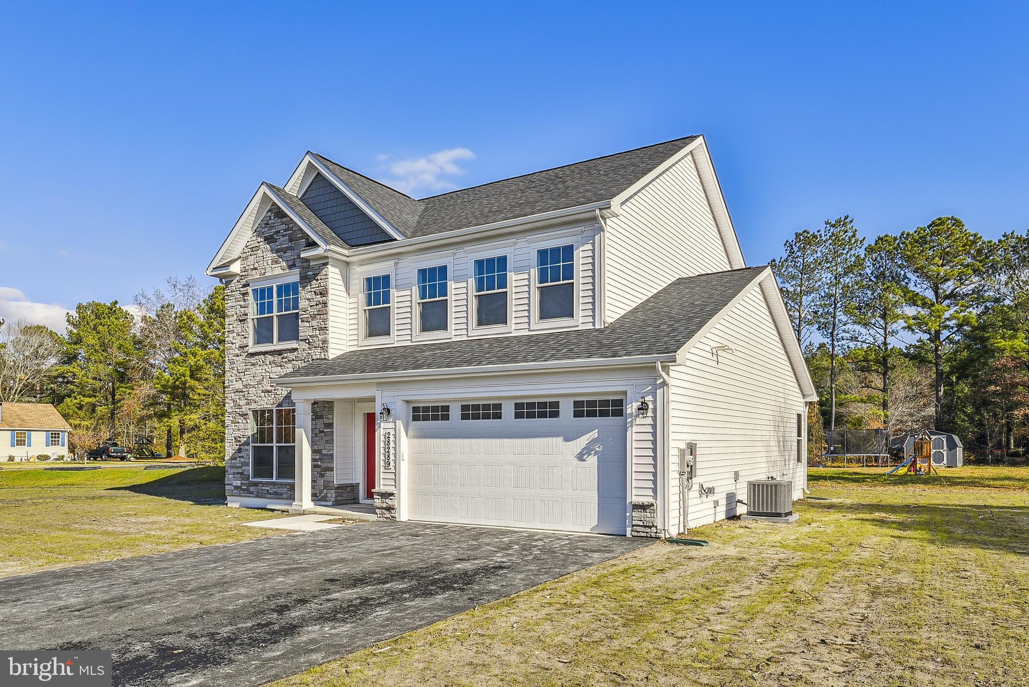 15330 Hildegard Lane Silver Spring, MD 20905 - Photo 6 of 45 a front view of a house with a yard