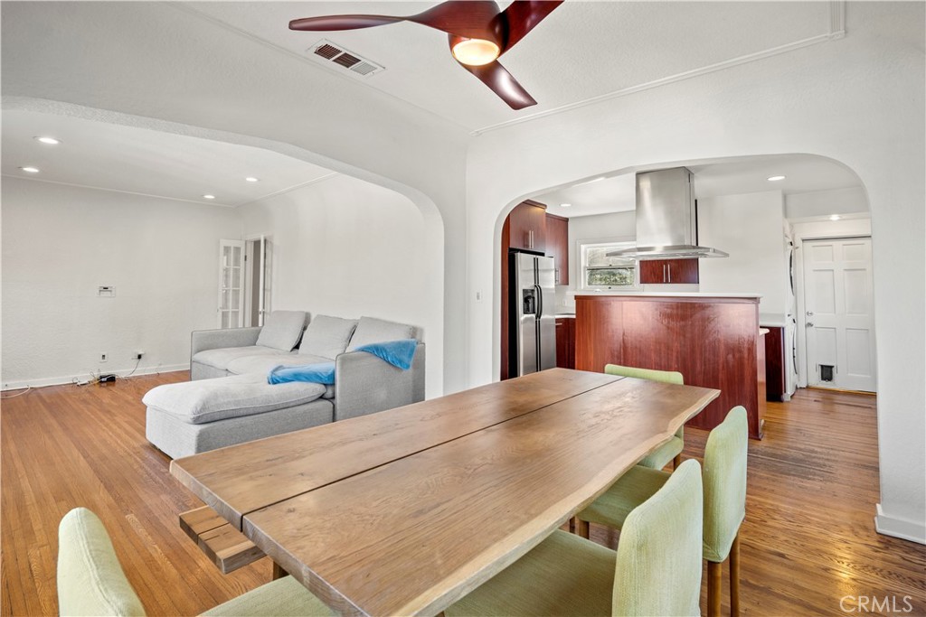 2559 Corralitas Drive Silver Lake, CA 90039 - Photo 14 of 54 a kitchen with stainless steel appliances kitchen island granite countertop a refrigerator and microwave
