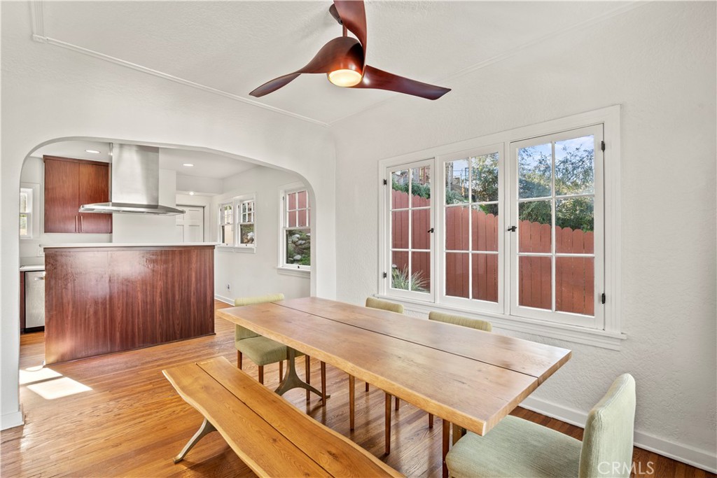 2559 Corralitas Drive Silver Lake, CA 90039 - Photo 17 of 54 a view of a dining room with furniture window and wooden floor