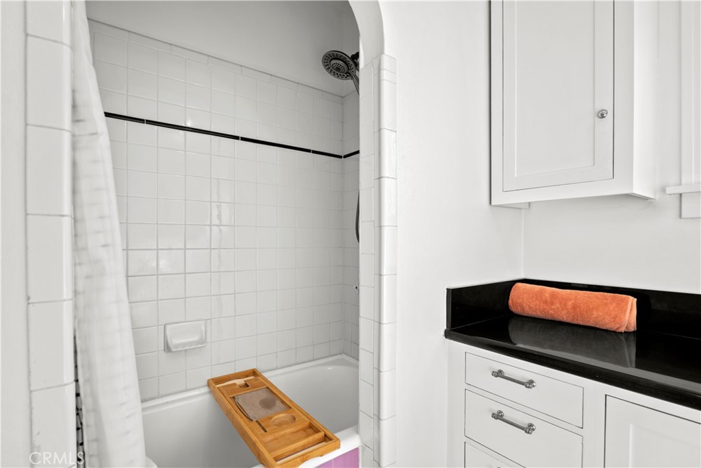 2559 Corralitas Drive Silver Lake, CA 90039 - Photo 30 of 54 a bathroom with a bathtub and shower