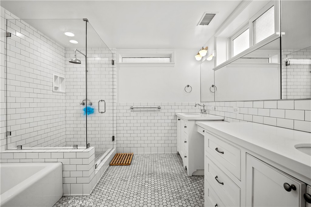 2559 Corralitas Drive Silver Lake, CA 90039 - Photo 41 of 54 a bathroom with a sink a toilet a mirror and shower
