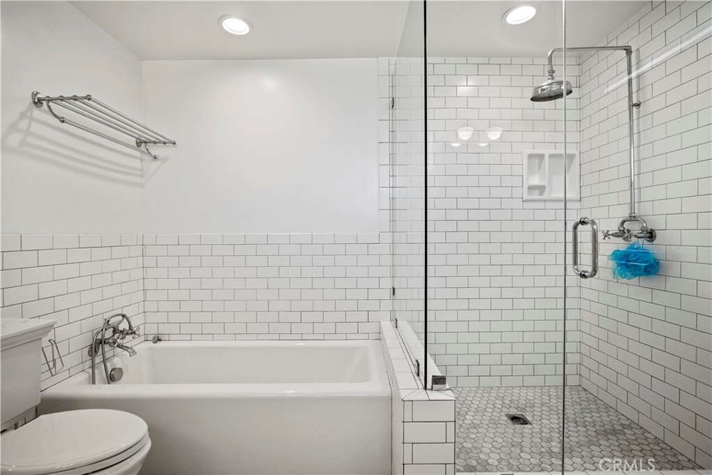 2559 Corralitas Drive Silver Lake, CA 90039 - Photo 42 of 54 a bathroom with a bathtub and shower