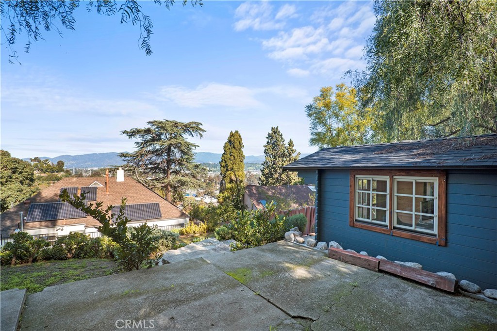 2559 Corralitas Drive Silver Lake, CA 90039 - Photo 50 of 54 a front view of a house with a yard and garage