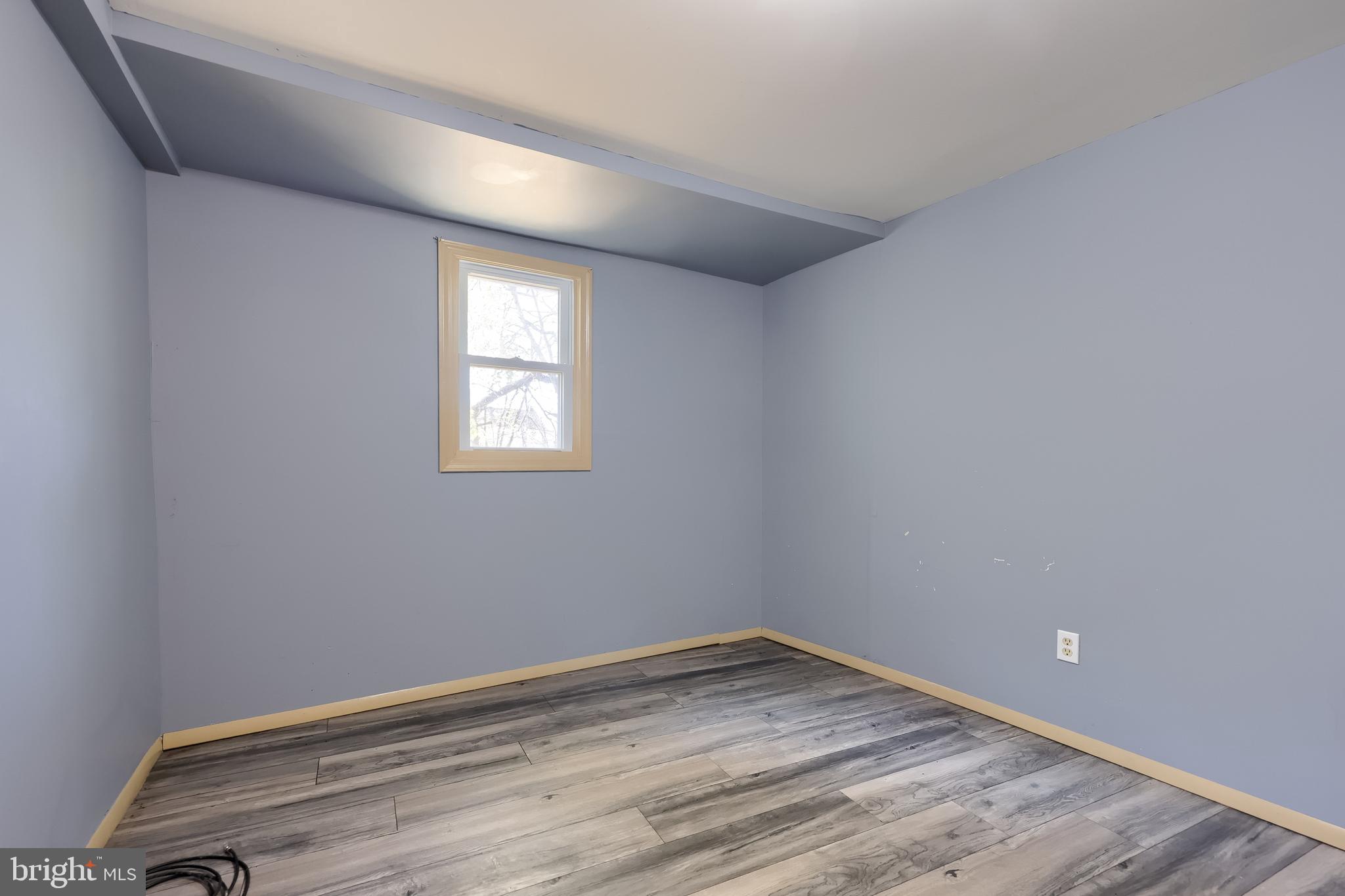 238 South 4th Street Columbia, PA 17512 - Photo 12 of 16 a view of empty room with wooden floor and fan