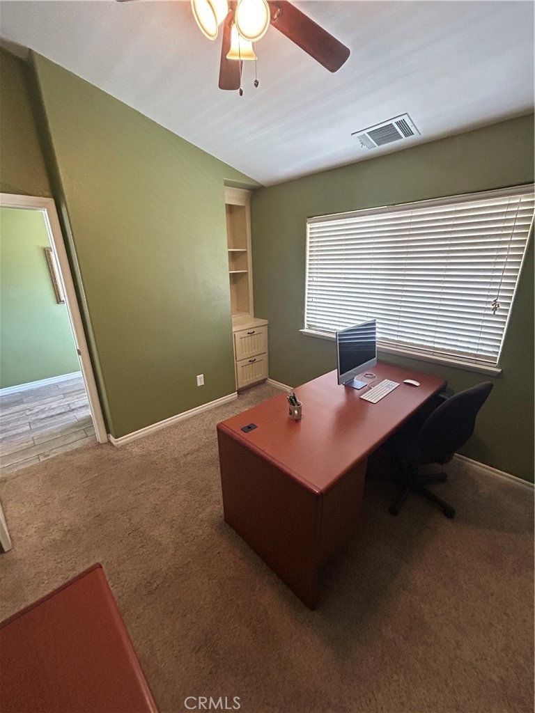 5935 Monte Vista Road Phelan, CA 92371 - Photo 33 of 58 a backyard of a house with table and chairs