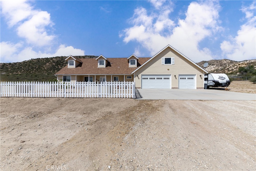 5935 Monte Vista Road Phelan, CA 92371 - Photo 4 of 58 a view of a house with a backyard