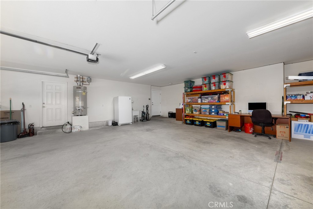 5935 Monte Vista Road Phelan, CA 92371 - Photo 44 of 58 a view of a garage with toys