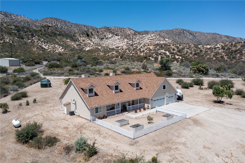 5935 Monte Vista Road Phelan, CA 92371 - Photo 52 of 58 an aerial view of a house with a mountain