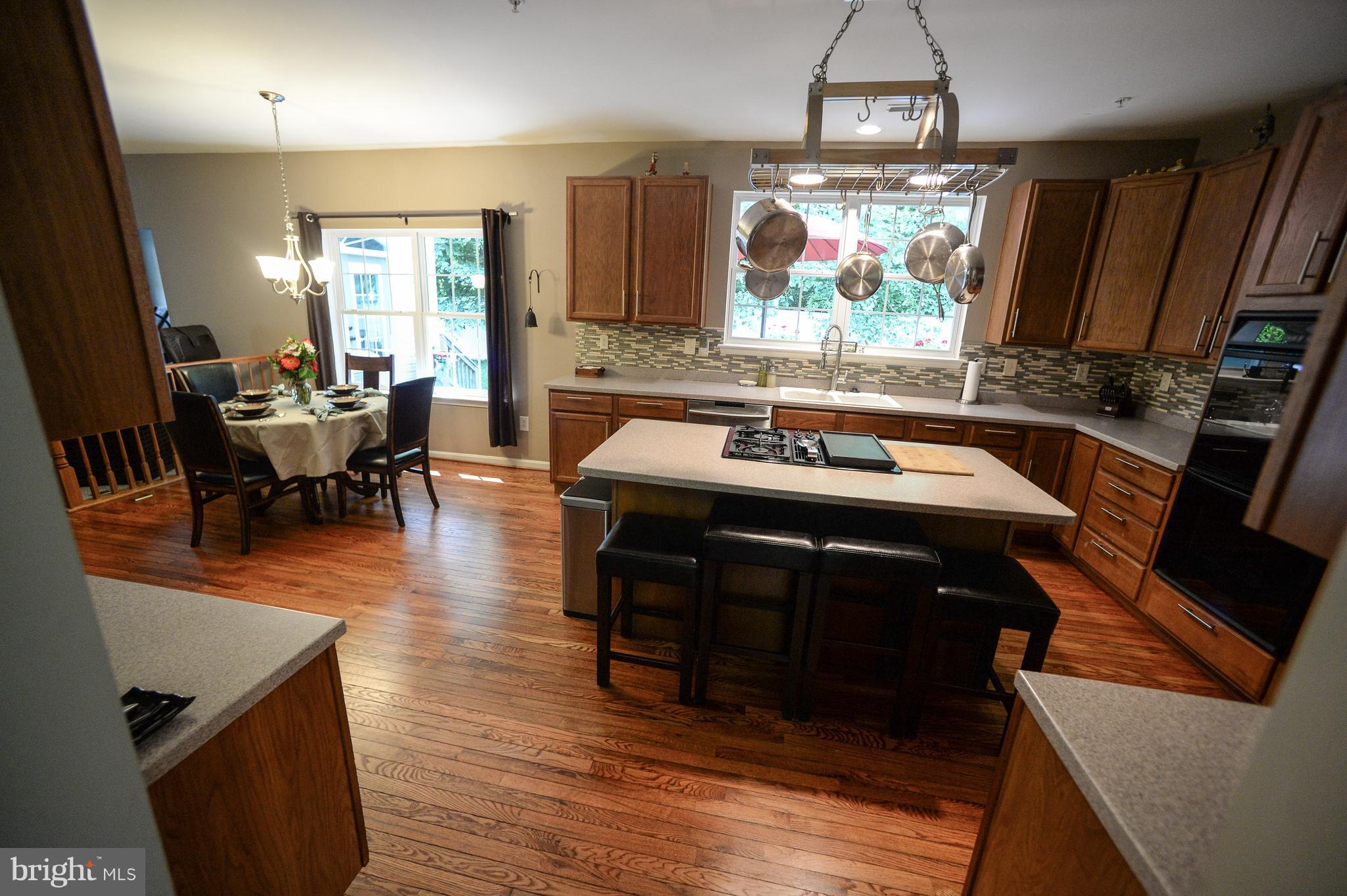 12017 Cross Rd Trail Brandywine, MD 20613 - Photo 3 of 30 Gourmet eat-in kitchen w/ breakfast bar