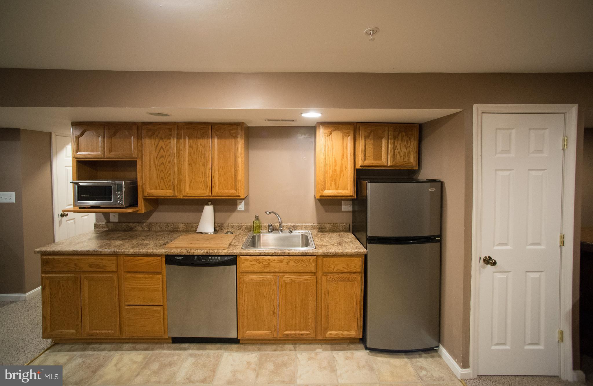 12017 Cross Rd Trail Brandywine, MD 20613 - Photo 21 of 30 No need to run upstairs the wet bar is right here