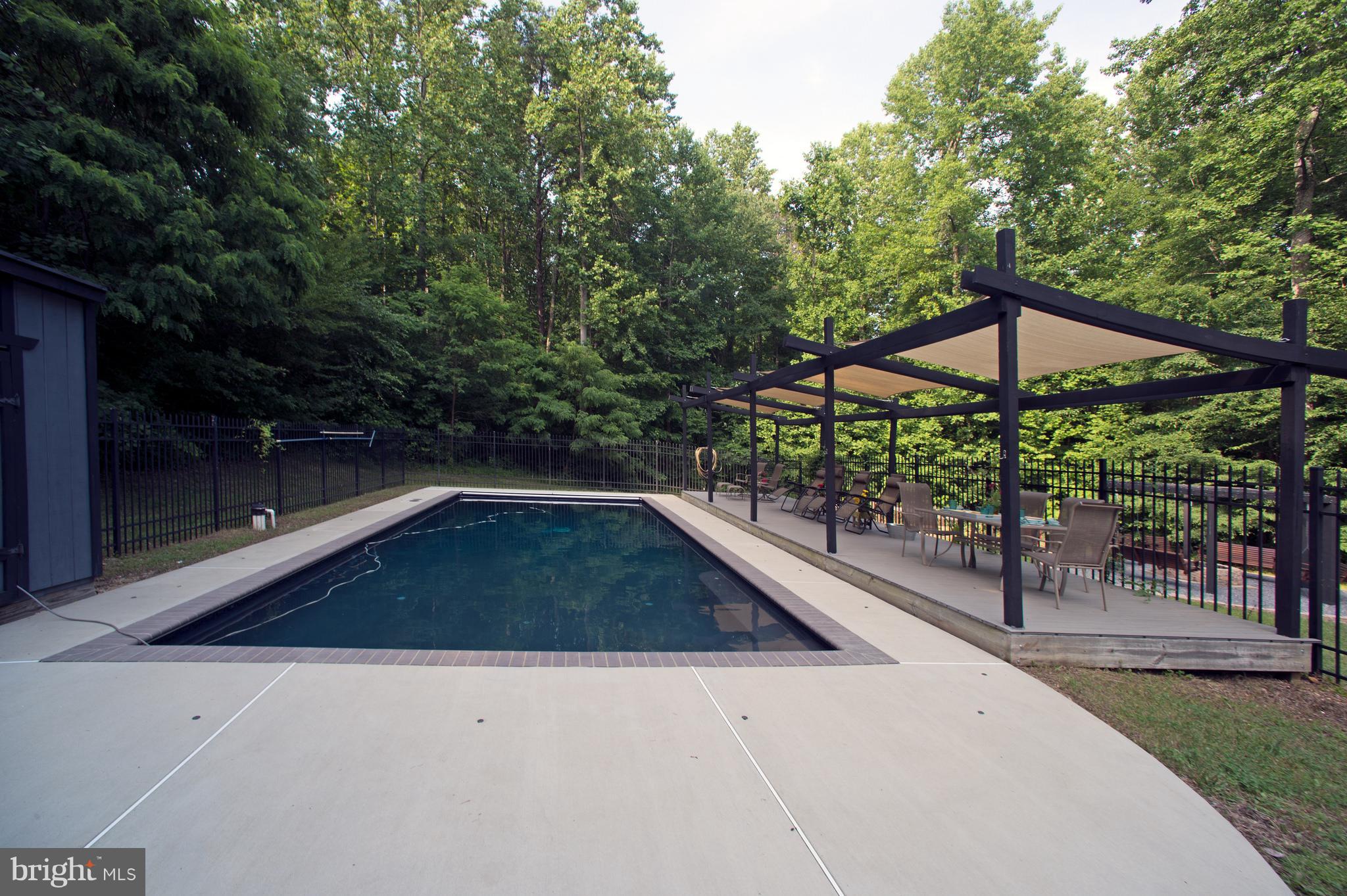 12017 Cross Rd Trail Brandywine, MD 20613 - Photo 23 of 30 Hard to find black bottom pool with shaded deck