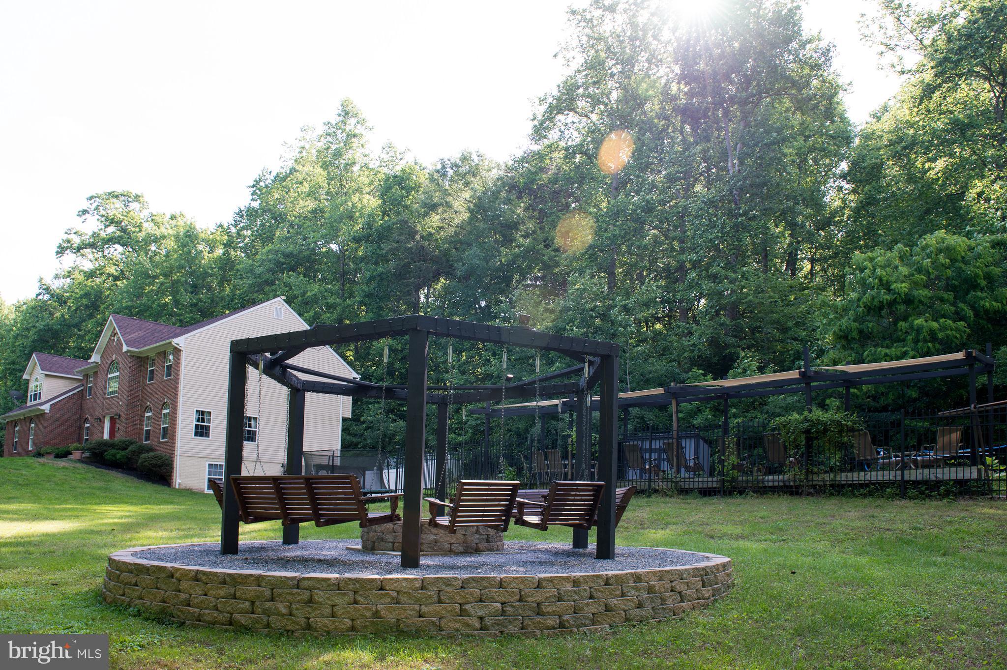 12017 Cross Rd Trail Brandywine, MD 20613 - Photo 27 of 30 Fire pit perfect for s'mores w/ family and friends